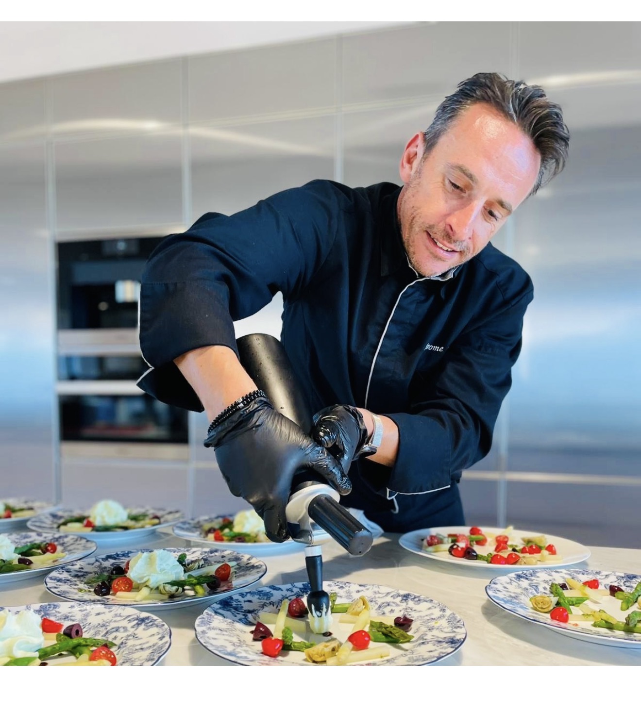 Chef Jérôme Abraham finishing a plate